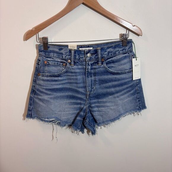 AE77  American Eagle The High Rise Cuff-OFF Medium Wash 27 Jean Shorts NEW - Picture 2 of 13